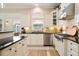 Stylish kitchen featuring white cabinets, granite countertops, and stainless steel appliances at 1860 Leighton Ln, Marietta, GA 30062