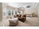 Spacious main bedroom featuring a trey ceiling, large windows, hardwood floors, and a comfortable seating area at 1860 Leighton Ln, Marietta, GA 30062