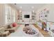 Spacious playroom featuring built-in bookshelves, playful decor, and plenty of room for activities and fun for children at 1860 Leighton Ln, Marietta, GA 30062