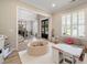 Bright playroom with shuttered windows, offering play space with a ball pit, built-in shelves, and comfortable seating at 1860 Leighton Ln, Marietta, GA 30062
