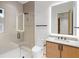 Modern bathroom boasts a glass shower, stylish vanity, and sleek fixtures at 16 Bonnie Ln, Atlanta, GA 30328