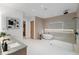 Bathroom features a large shower, soaker tub, double vanity, and modern fixtures at 16 Bonnie Ln, Atlanta, GA 30328