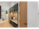Mud room with storage lockers, built-in bench, cabinets, and natural wood accents at 16 Bonnie Ln, Atlanta, GA 30328