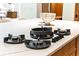 Close up of stovetop on marble kitchen island at 16 Bonnie Ln, Atlanta, GA 30328