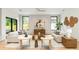 Bright living room featuring modern furniture, neutral colors, and a decorative ceiling fan at 16 Bonnie Ln, Atlanta, GA 30328