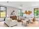 Contemporary living room featuring neutral tones, natural light, and modern decor at 16 Bonnie Ln, Atlanta, GA 30328