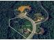 Aerial view of the property highlighting the .89 acre lot, cul-de-sac location, and surrounding wooded area at 893 Somersby Dr, Dallas, GA 30157