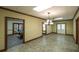 Finished basement with neutral tones, tile flooring, and a pool table area at 893 Somersby Dr, Dallas, GA 30157