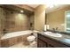 Bathroom featuring a large, tiled shower, vanity, and granite countertop at 893 Somersby Dr, Dallas, GA 30157