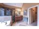 Bathroom with glass shower, soaking tub, vanity with cabinets, and natural light from the window at 893 Somersby Dr, Dallas, GA 30157