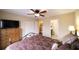 Bedroom with hardwood flooring, closet, and adjacent bathroom area at 893 Somersby Dr, Dallas, GA 30157