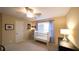 Bedroom with neutral walls, a white crib, and a dark dresser with decor at 893 Somersby Dr, Dallas, GA 30157