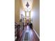 Spacious foyer with hardwood floors, decorative lighting, and high ceilings that create an inviting ambiance at 893 Somersby Dr, Dallas, GA 30157