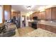 Updated kitchen featuring granite countertops, stainless steel appliances, and ample cabinet space at 893 Somersby Dr, Dallas, GA 30157