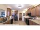 Well-equipped kitchen with stainless steel appliances and granite countertops at 893 Somersby Dr, Dallas, GA 30157