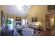 Bright and airy living room boasting hardwood floors, fireplace, and large windows offers a cozy space at 893 Somersby Dr, Dallas, GA 30157