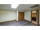 Bonus room with hardwood floors, a closet, and doorway access to another room at 893 Somersby Dr, Dallas, GA 30157