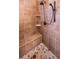 Shower stall with tiled walls, built-in bench, and adjustable shower head at 893 Somersby Dr, Dallas, GA 30157