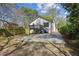 Expansive backyard featuring a wooden deck, a concrete pad, and plenty of space for outdoor activities at 1833 Flat Shoals Se Rd, Atlanta, GA 30316
