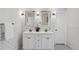 Elegant bathroom features a dual sink vanity, subway tile, and modern fixtures at 1833 Flat Shoals Se Rd, Atlanta, GA 30316