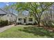 Charming home with a well-maintained lawn, mature trees, and inviting curb appeal at 1833 Flat Shoals Se Rd, Atlanta, GA 30316