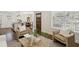 Open concept Living Room provides views to the Kitchen, Dining Area, and front yard at 1833 Flat Shoals Se Rd, Atlanta, GA 30316