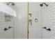 Beautiful tiled shower with dual shower heads and built-in storage niches at 1833 Flat Shoals Se Rd, Atlanta, GA 30316