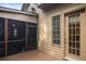 Inviting outdoor space features a screened porch and a seamless transition to indoor living at 208 Grandmar, Canton, GA 30115