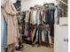 Spacious walk-in closet offers generous storage solutions for clothing, shoes, and personal items at 208 Grandmar, Canton, GA 30115