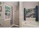 Bathroom with shower and bathtub at 228 Kensington Trce, Stockbridge, GA 30281