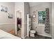 Bathroom with toilet, storage, vanity and closet at 228 Kensington Trce, Stockbridge, GA 30281