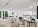 Finished basement area with bar seating and access to the outside at 2436 Ovidia Sw Cir, Atlanta, GA 30311