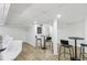 Finished basement area with modern bar stools, tables and chairs at 2436 Ovidia Sw Cir, Atlanta, GA 30311