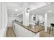 Finished basement with bar area, modern lighting, and seating at 2436 Ovidia Sw Cir, Atlanta, GA 30311