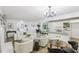 Spacious living room and kitchen with an open layout, perfect for modern living and entertaining at 2436 Ovidia Sw Cir, Atlanta, GA 30311