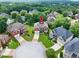 Aerial view of the property showcasing its location in a cul-de-sac and surrounded by lush greenery at 4203 Norbury Ct, Smyrna, GA 30080