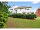 Well-maintained backyard featuring a manicured lawn and mature trees, offering a private and tranquil setting at 4203 Norbury Ct, Smyrna, GA 30080