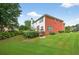 Spacious backyard with lush green lawn and mature landscaping, providing a serene outdoor retreat at 4203 Norbury Ct, Smyrna, GA 30080