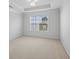 Neutral bedroom with carpeted floors, crown molding, and a large window at 4203 Norbury Ct, Smyrna, GA 30080