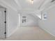 Bright bedroom features a tray ceiling, neutral paint, and carpet at 4203 Norbury Ct, Smyrna, GA 30080
