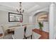 Elegant dining room with a large mirror, chandelier, and hardwood floors at 4203 Norbury Ct, Smyrna, GA 30080