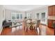 Bright living area featuring hardwood floors, sliding glass doors, and an eat-in kitchen at 4203 Norbury Ct, Smyrna, GA 30080