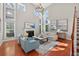 Spacious living room with soaring ceilings, natural light, and modern decor at 4203 Norbury Ct, Smyrna, GA 30080