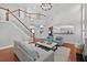 Open-concept living room features hardwood floors, fireplace and bright, neutral decor at 4203 Norbury Ct, Smyrna, GA 30080