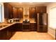 Well-equipped kitchen featuring granite countertops, stainless steel appliances, and abundant cabinetry at 4645 Valais Ct # 10, Johns Creek, GA 30022
