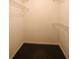 Walk-in closet equipped with wire shelving for organized storage and efficient use of space at 4645 Valais Ct # 10, Johns Creek, GA 30022