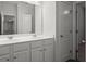 Bright bathroom with double sinks and plenty of storage at 5575 Mirror Lake Dr, Cumming, GA 30028