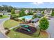 Gathering-friendly community pool area with playground, picnic space, and lounge seating at 5575 Mirror Lake Dr, Cumming, GA 30028