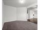 Spacious carpeted living room at 5575 Mirror Lake Dr, Cumming, GA 30028