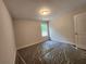 Comfortable bedroom featuring a window for natural light at 68 Jeffrey Ln, Dallas, GA 30157
